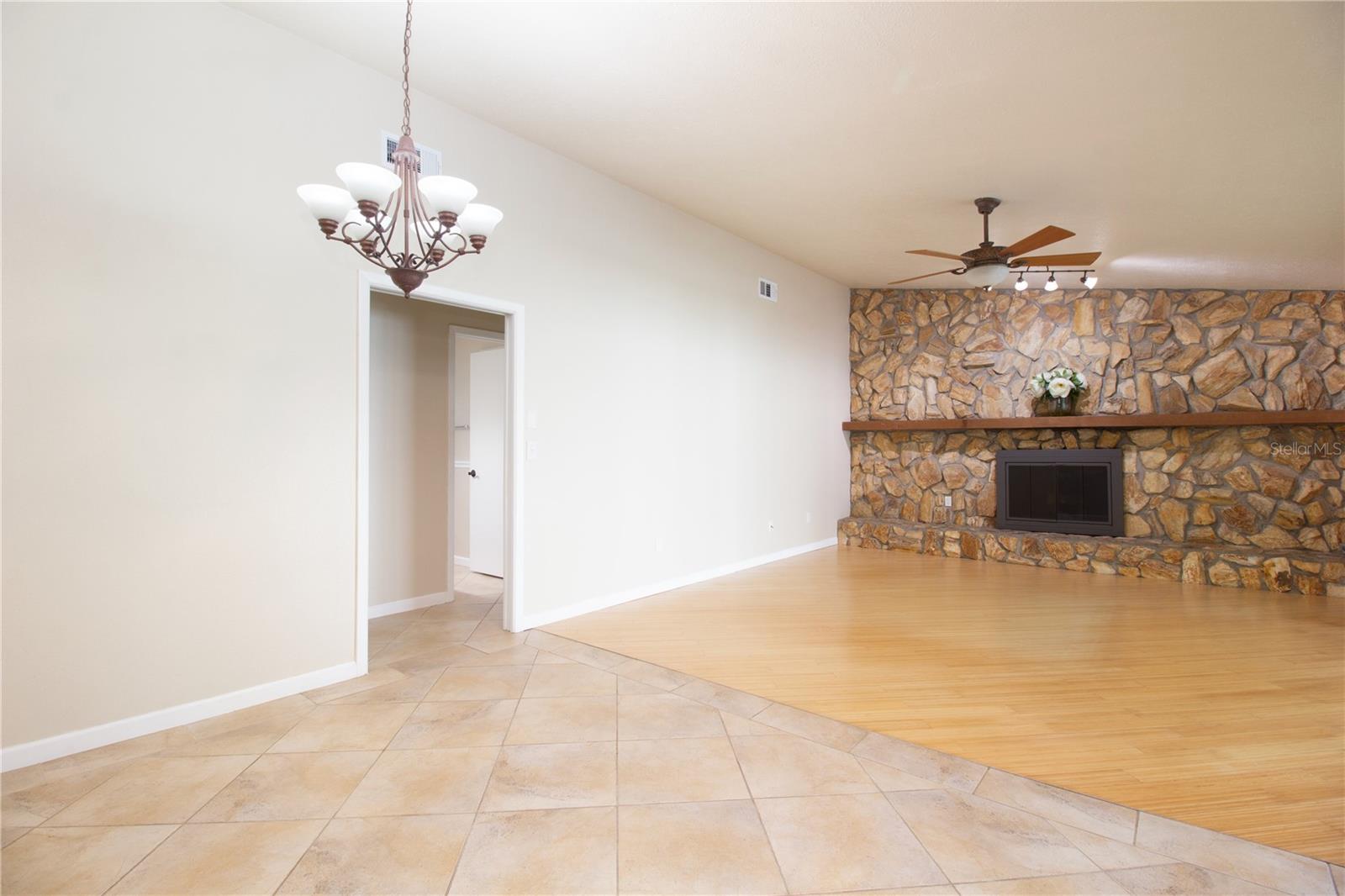 Spacious Family Room with Stone Fireplace