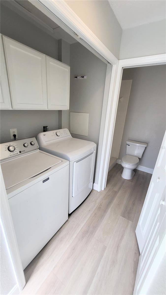 Full size washer and dryer inside