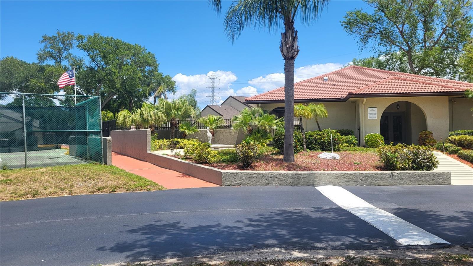 Club House and Entrance to Courts and Pool