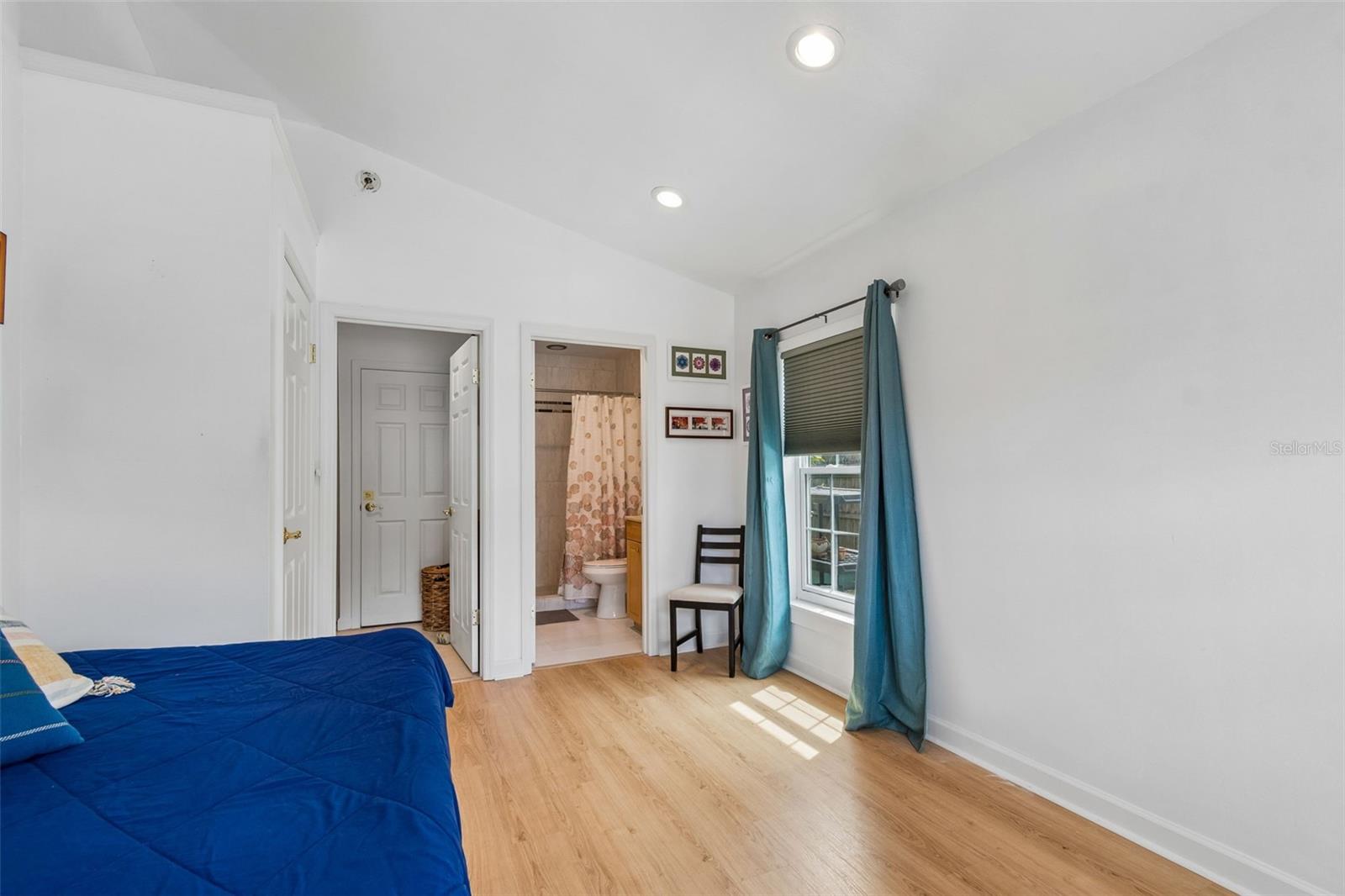 Spacious master bedroom has vaulted ceilings