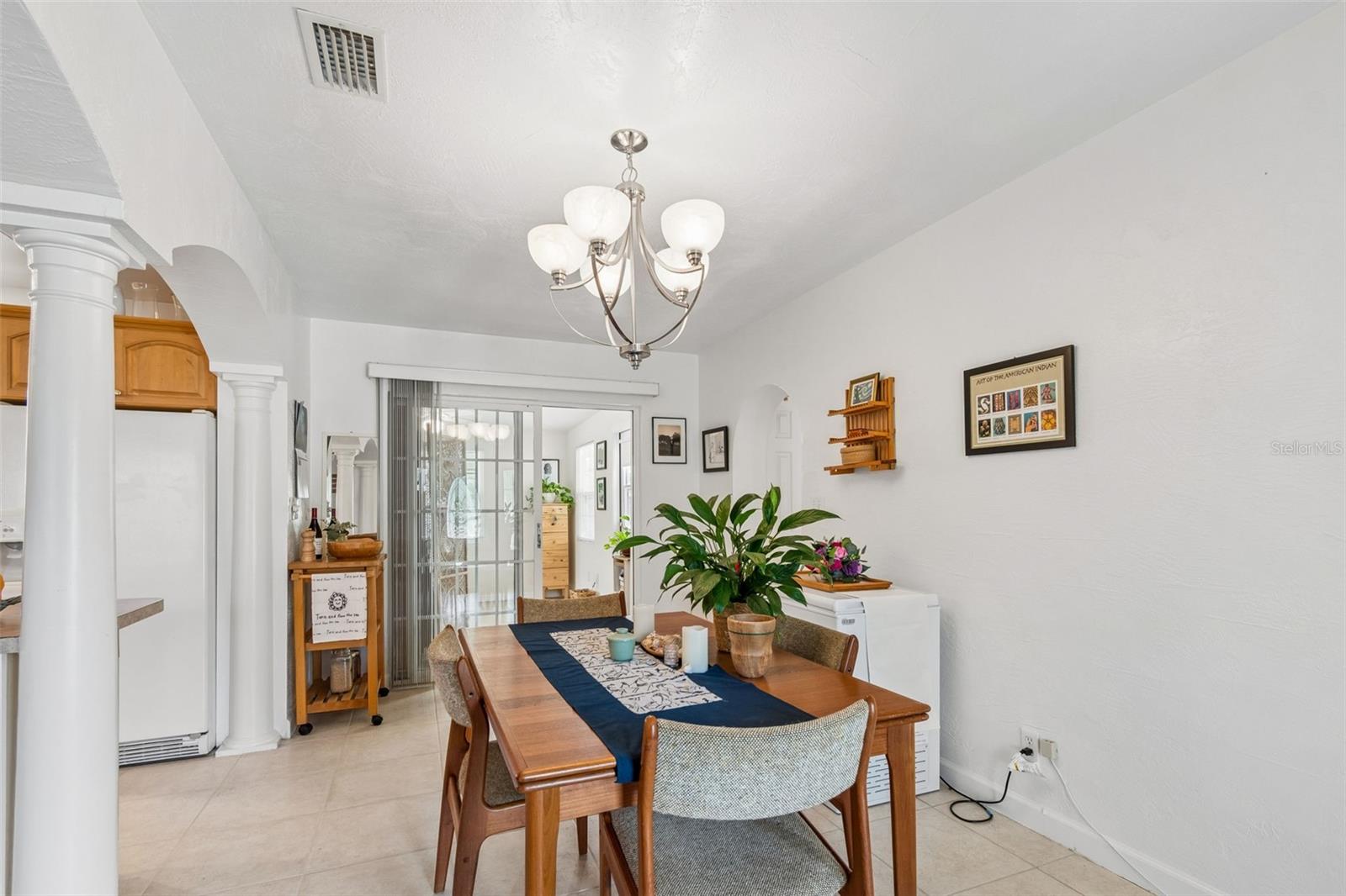 Doors leading to enclosed patio off the dining room and master