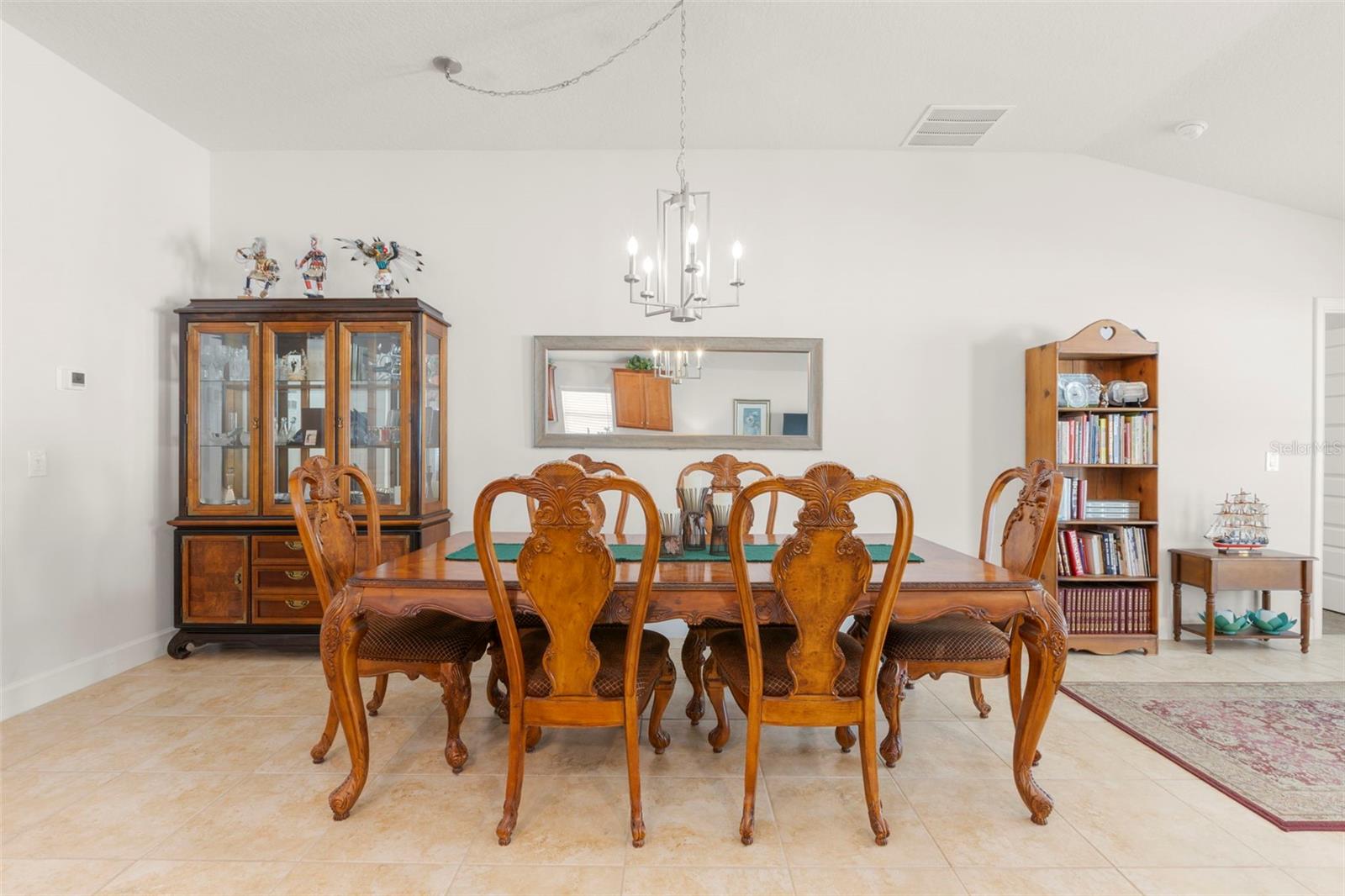 Generously sized to accommodate formal dining with ease, the dedicated dining area offers ample space for hosting holiday meals, dinner parties, and larger gatherings.