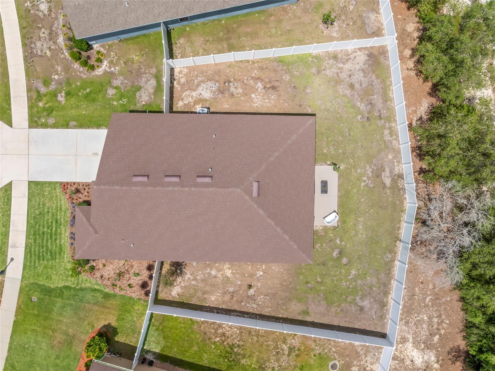 Aerial view emphasizing the expansive back yard.