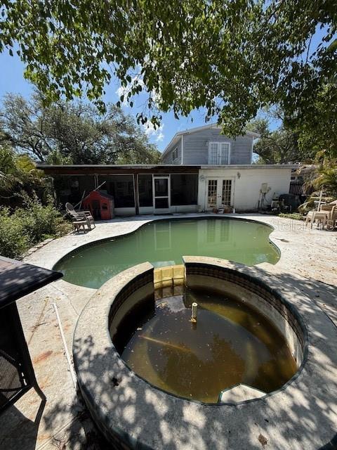 Pool/Spa view to house