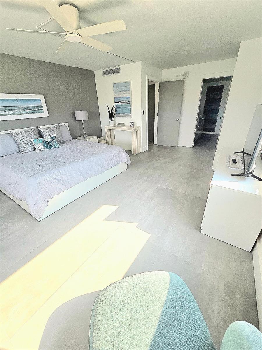 The Primary bedroom is huge and outfitted to the hilt!