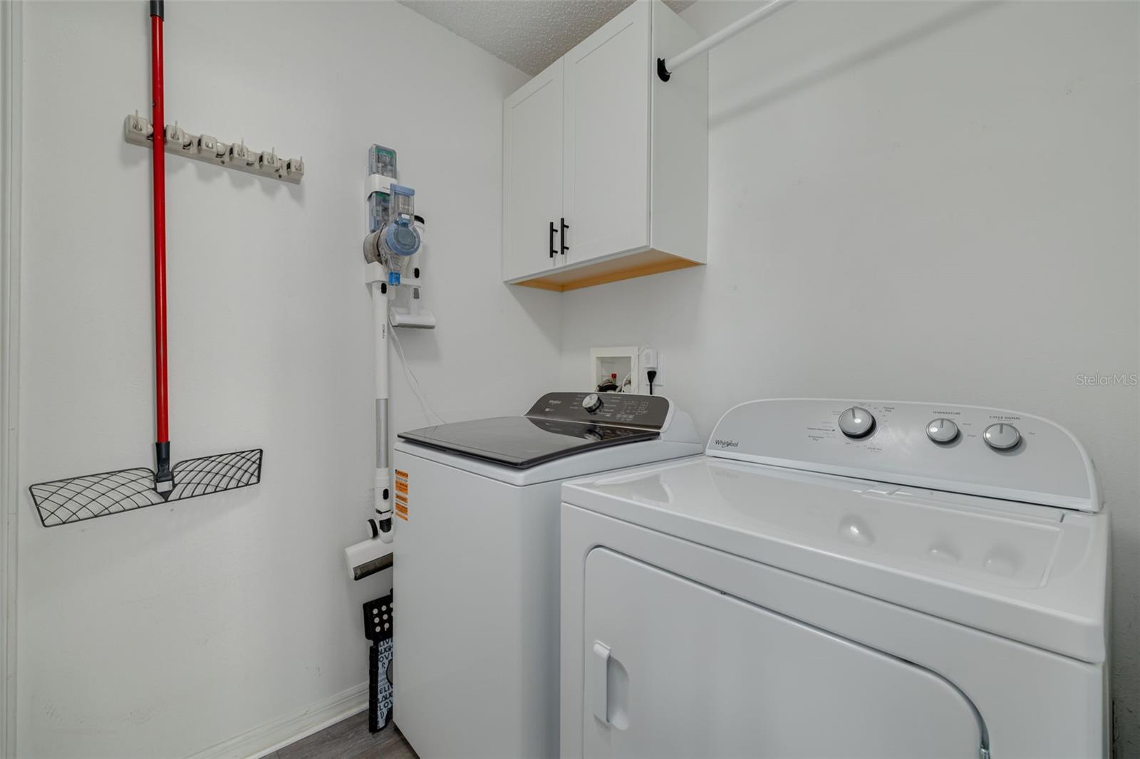 First floor laundry, washer and dryer convey