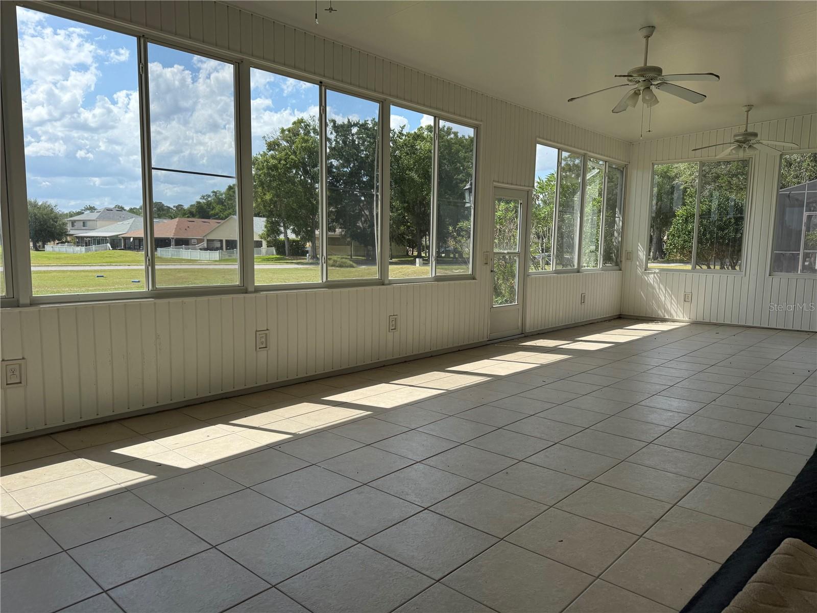 Sun Room Overlooking Lake Bernadette Golf Course