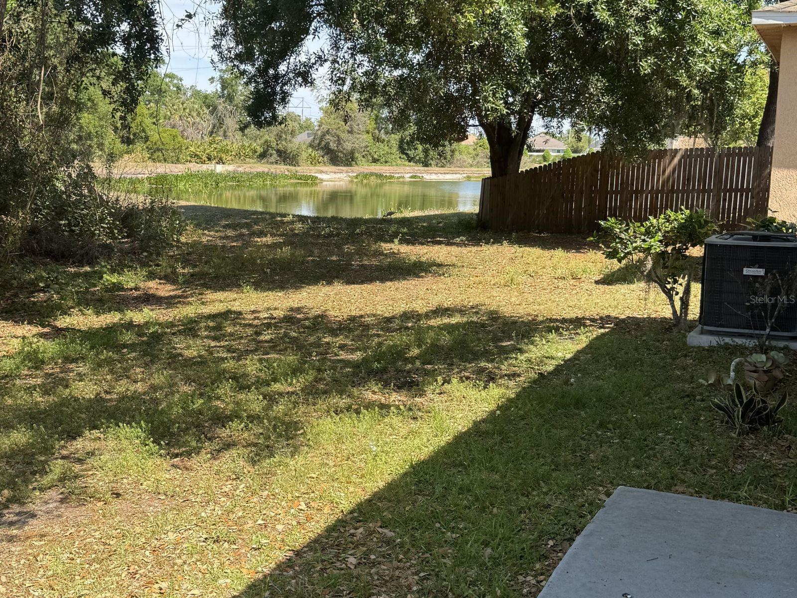 Step outside to your own backyard escape, where you can unwind on the patio while enjoying peaceful pond views and the sounds of nature.