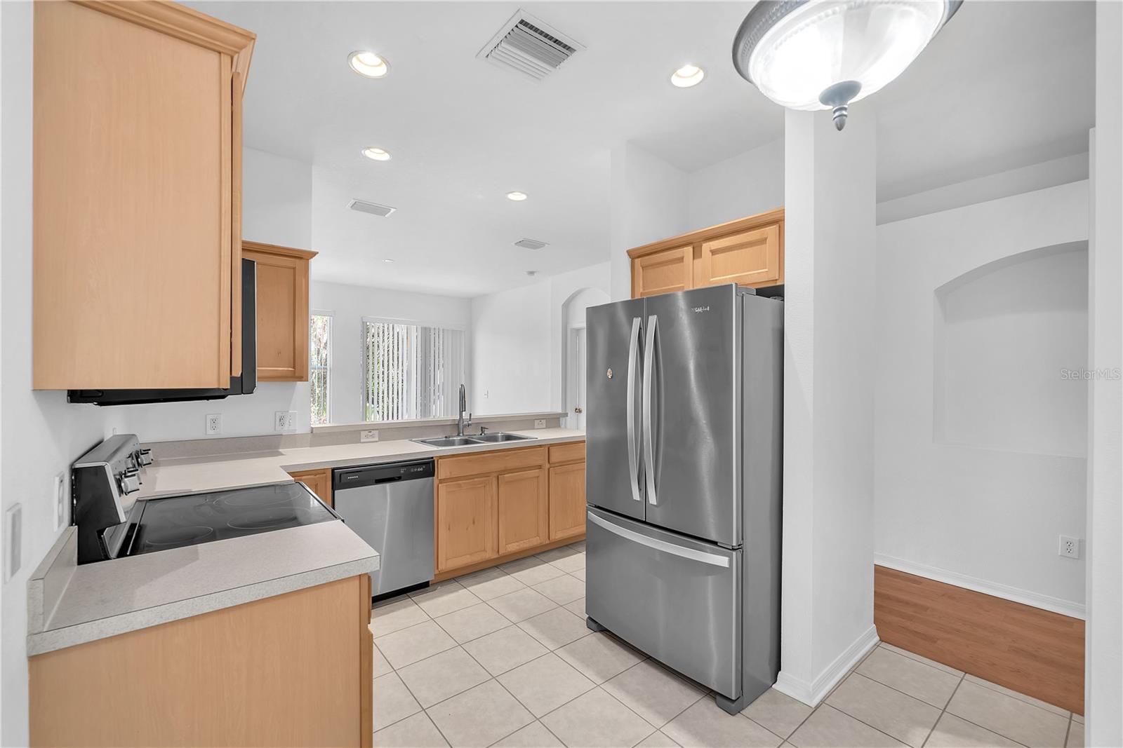 The heart of the home is the inviting kitchen.