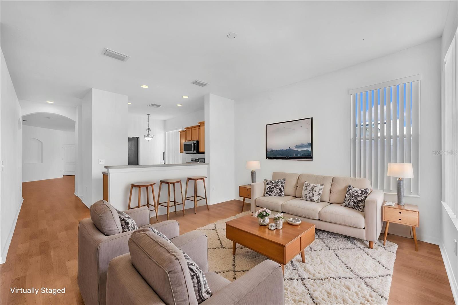 Just beyond the kitchen is a family room
