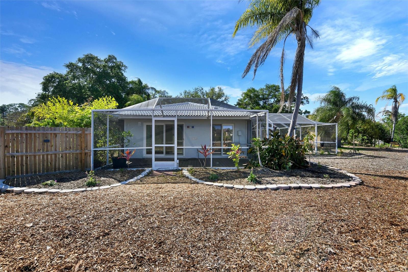 Private screen patio off of the master