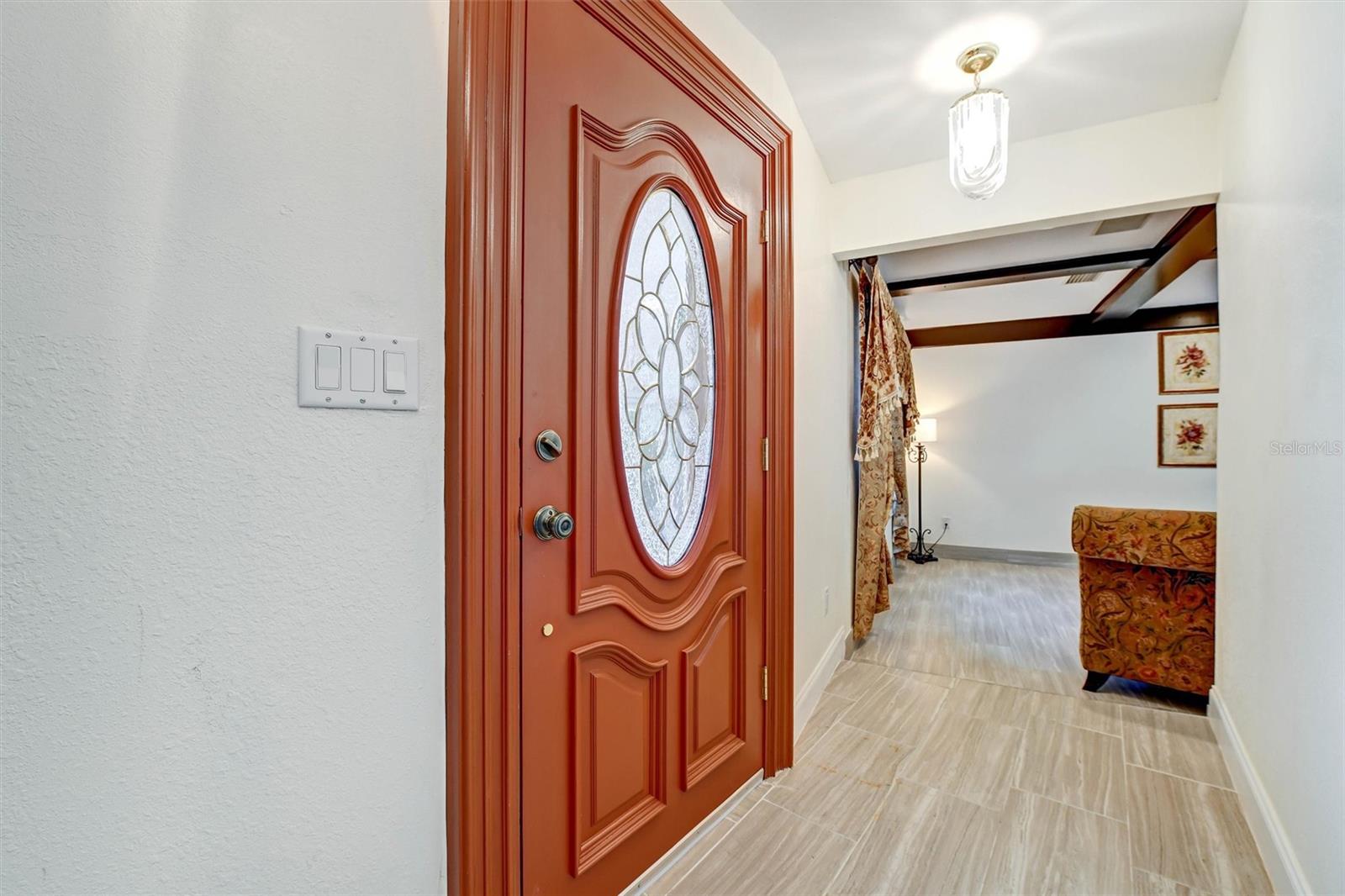 entry with family room to the R