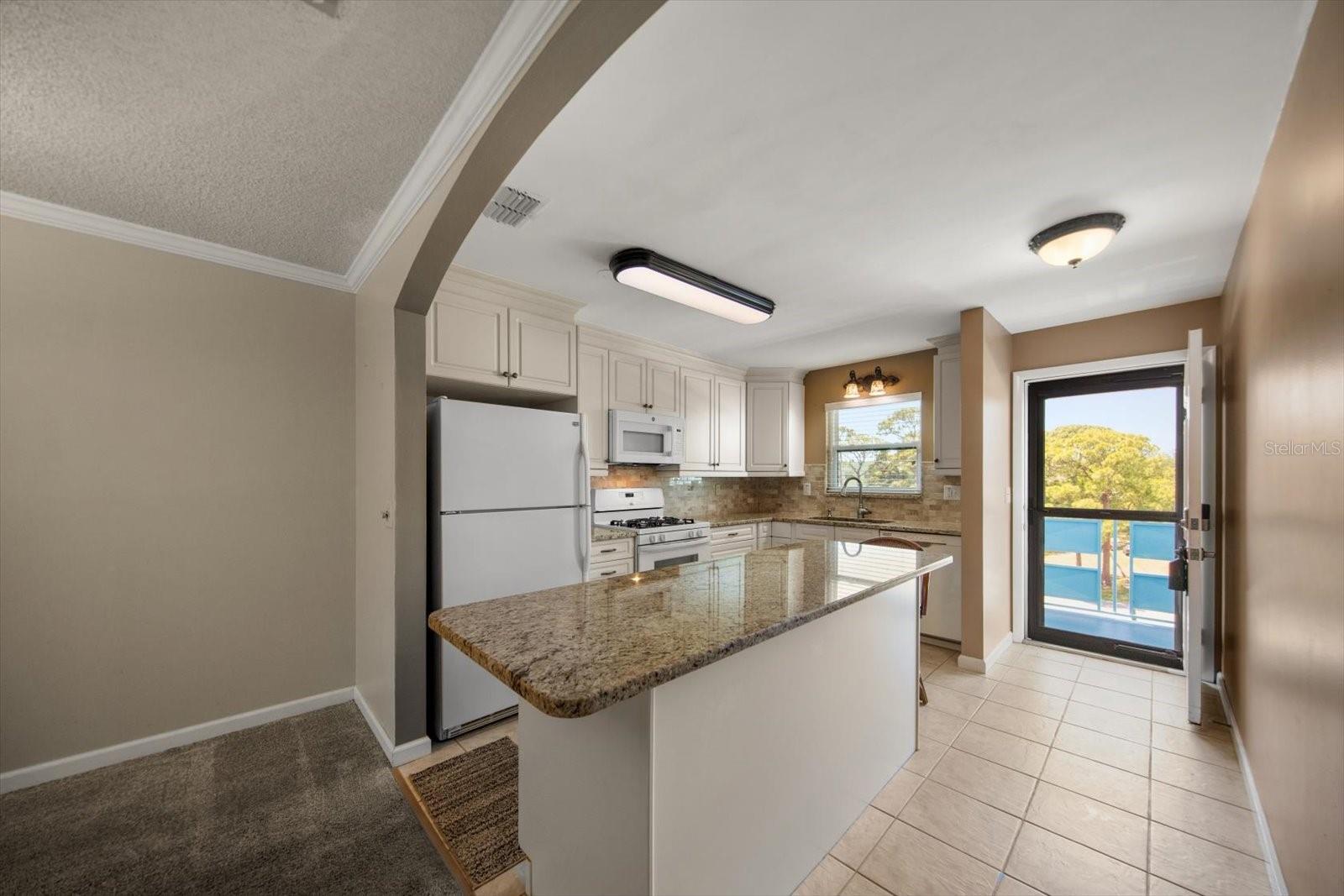 Gorgeous updated kitchen with lots of storage  and new lighting