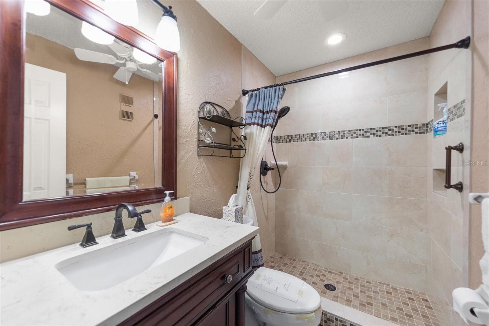 Primary bathroom tastefully updated