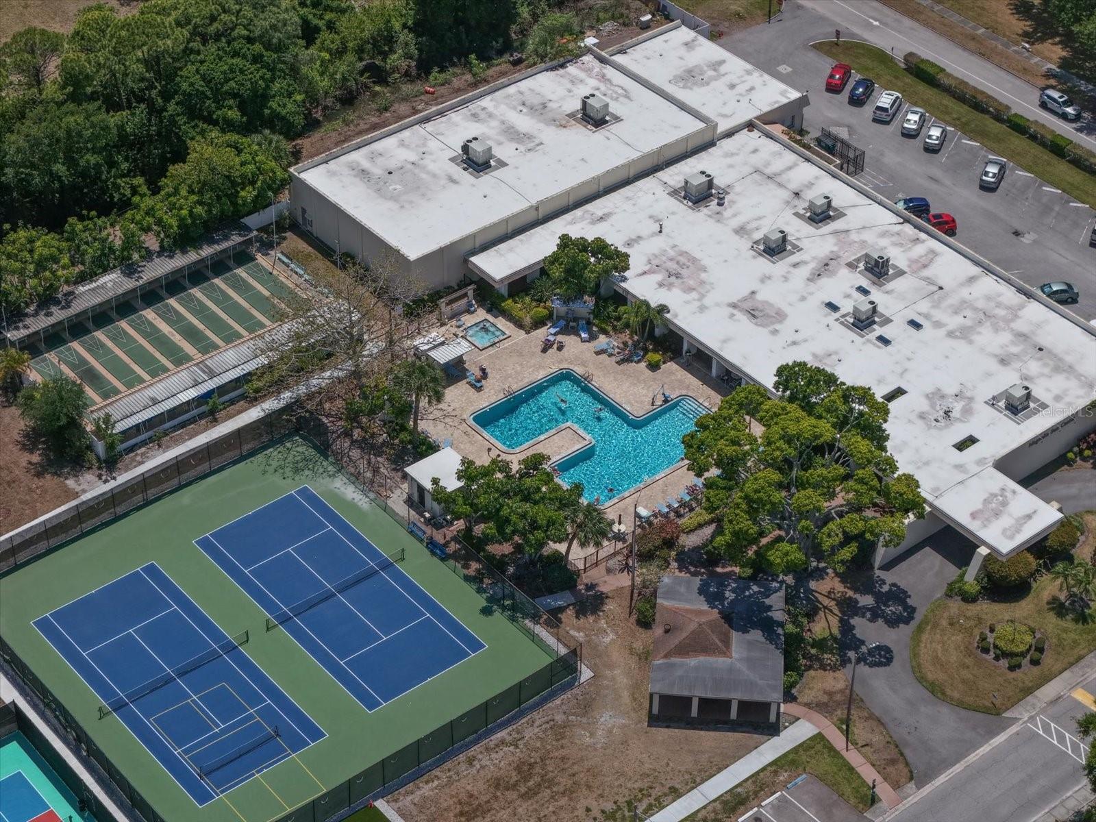 Magnolia clubhouse has the one of the fitness centers, shuffleboard, tennis courts and pickleball.  This is where all the dances and get togethers are held.