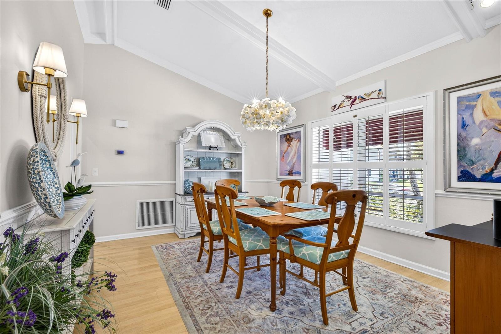 Dining room w/lighted sconces