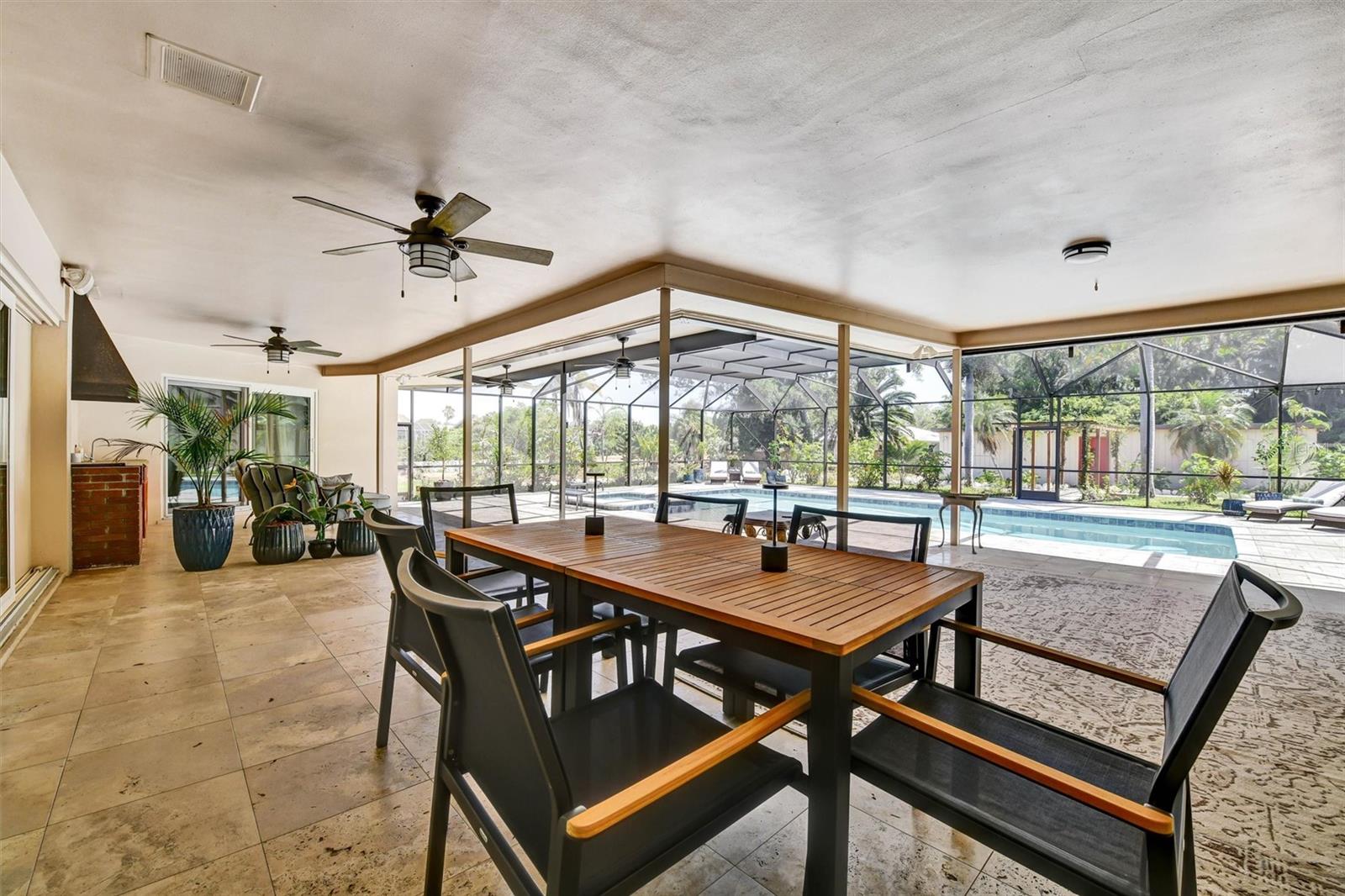 Covered living area off of the pool