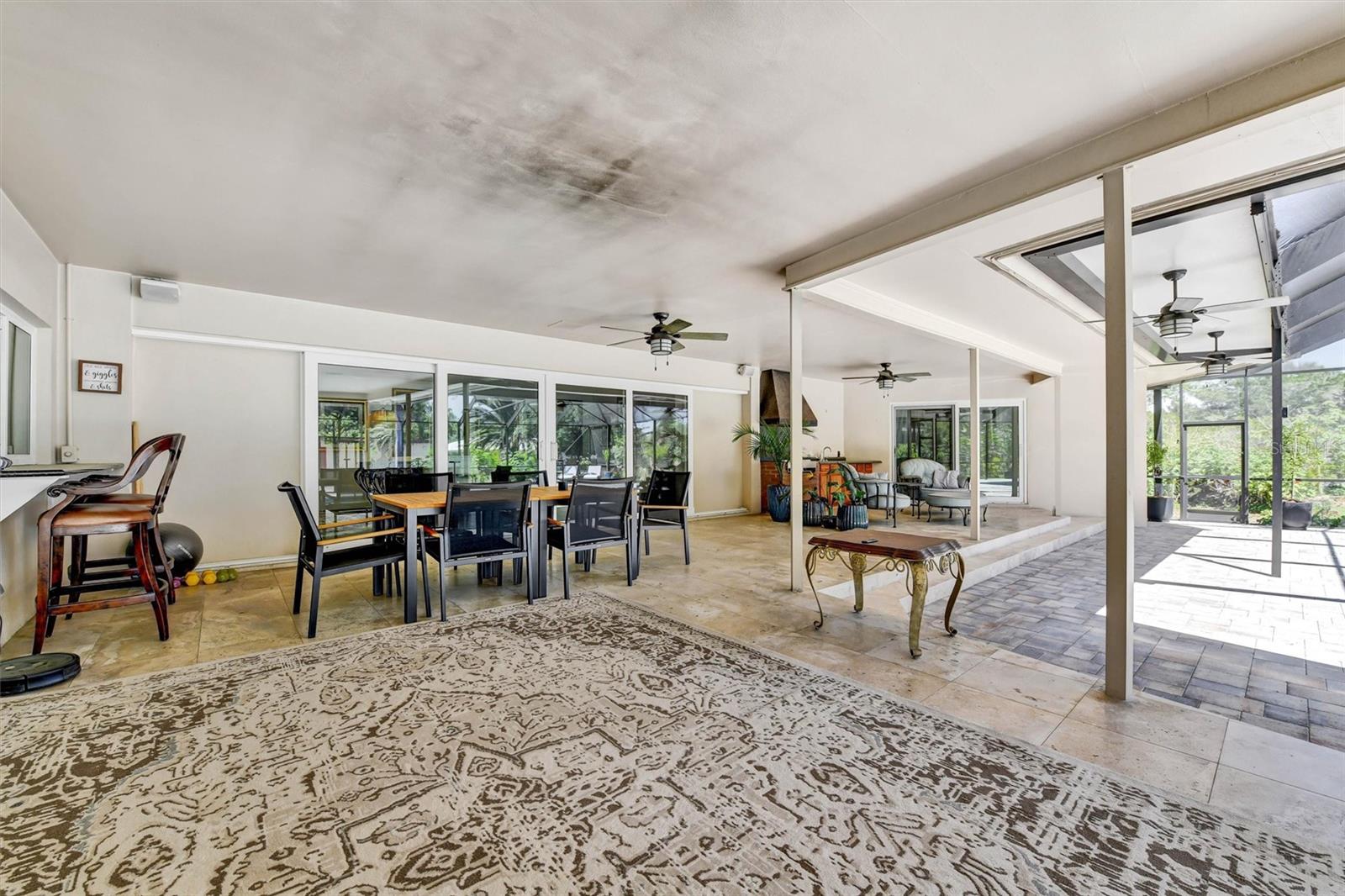 Covered living area off of pool