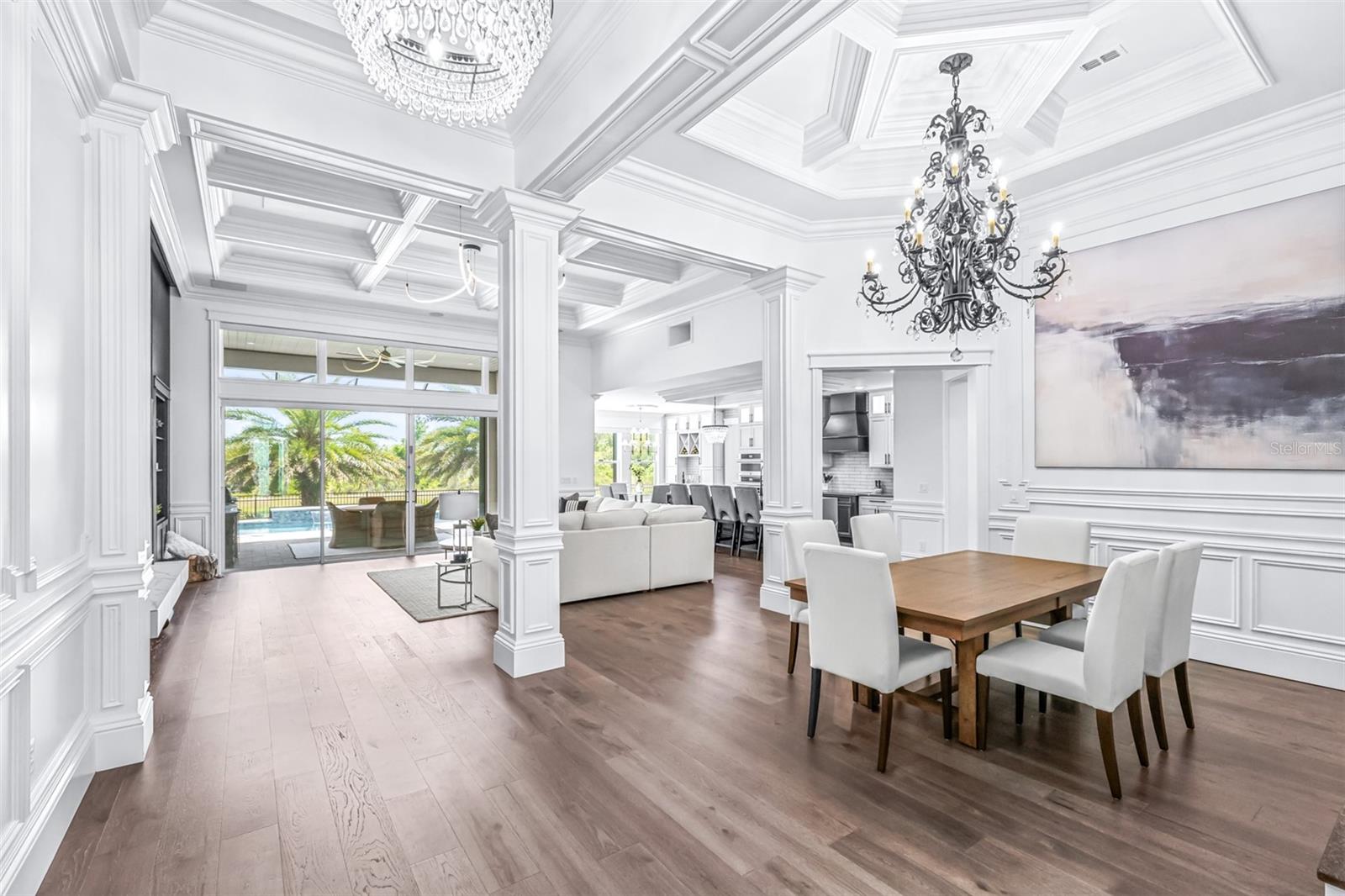 The Open Floorplan just Through the Foyer Gives Way to Smooth Level 5 Finished Walls and Beautiful Engineered Hardwood