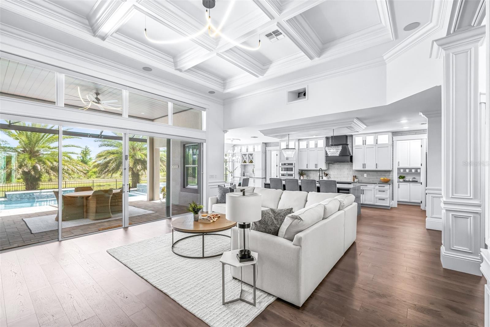 The Oversized Living Room is the Heart of the Home, Boasting Poplar Trim, Coffered Ceiling, a Tailor-made Home Theatre System Like No Other
