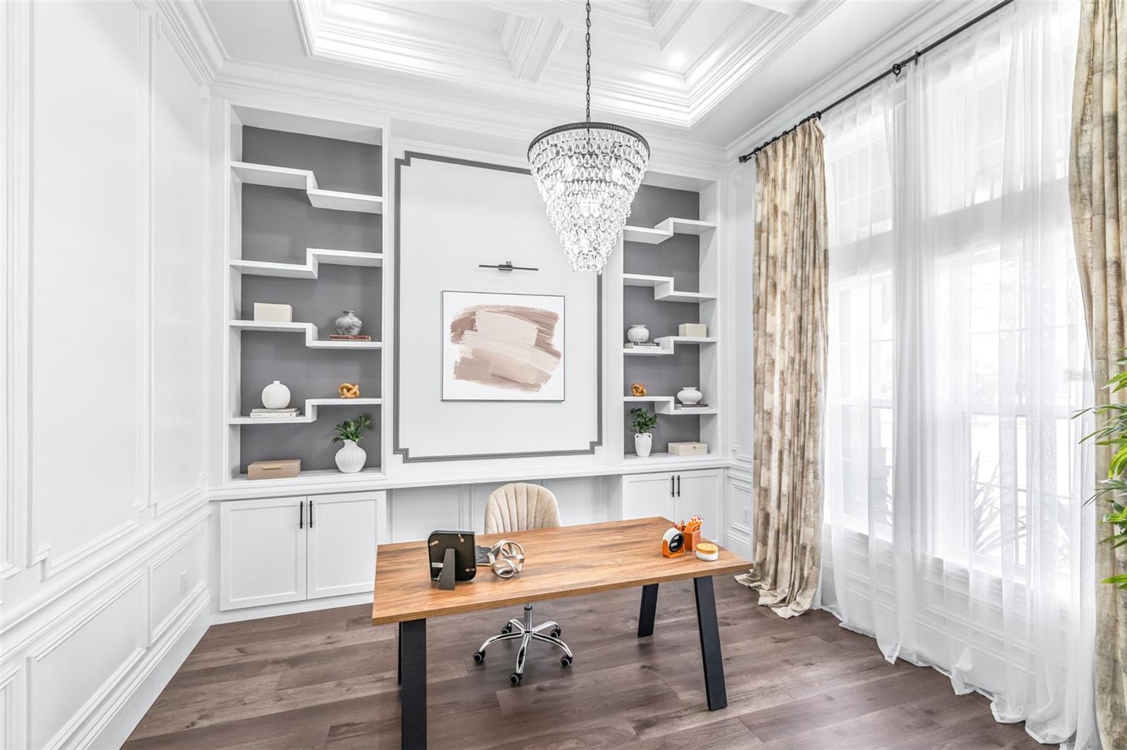Well-Appointed Office Features Custom Built-ins, Chandelier, and Poplar Trim Throughout
