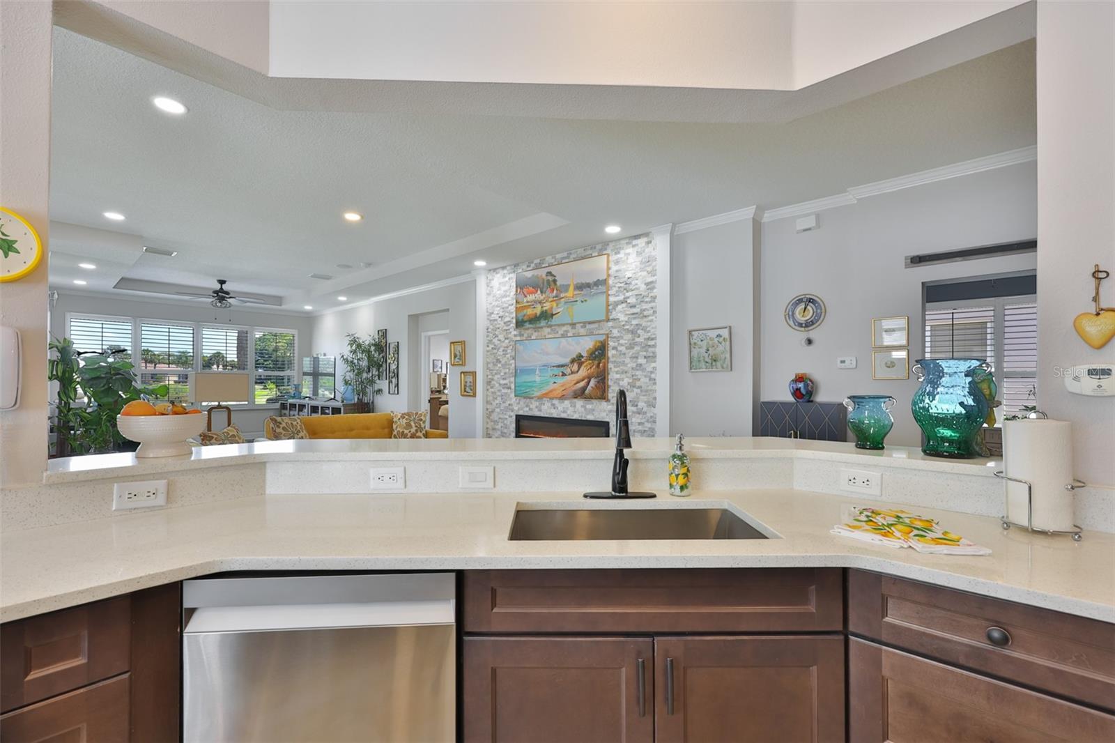 Even in the kitchen you have a view of the outside and water.