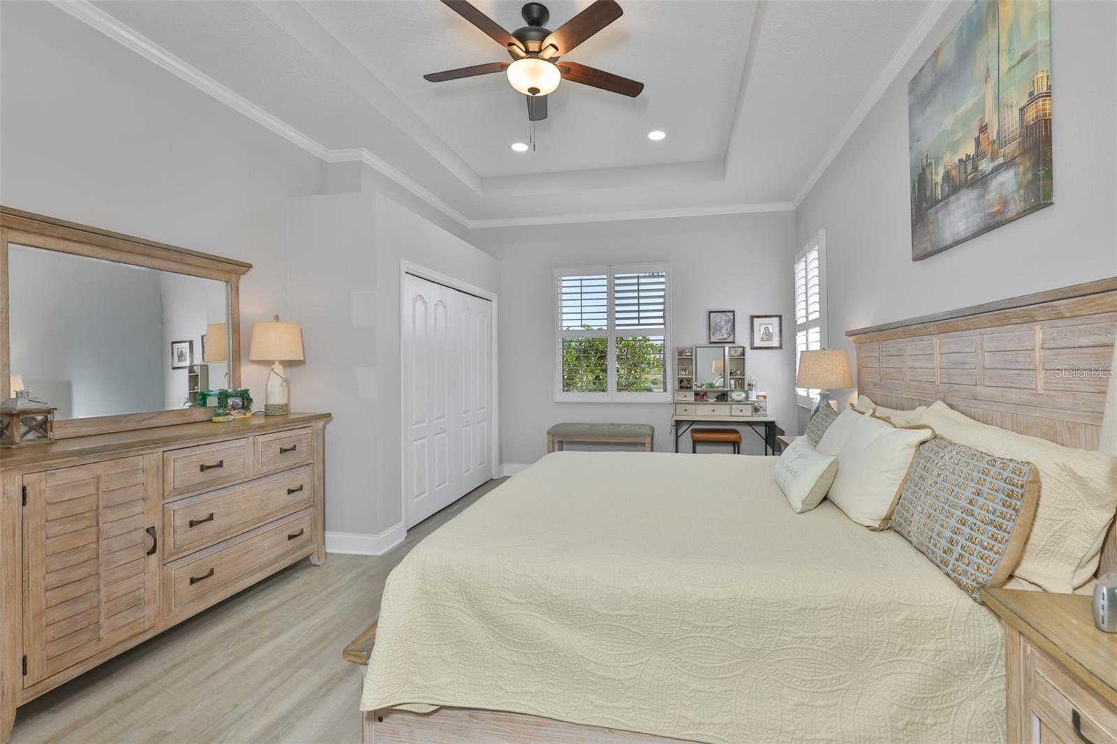 Multiple windows allow natural Florida sunshine into the room with a view of the water.