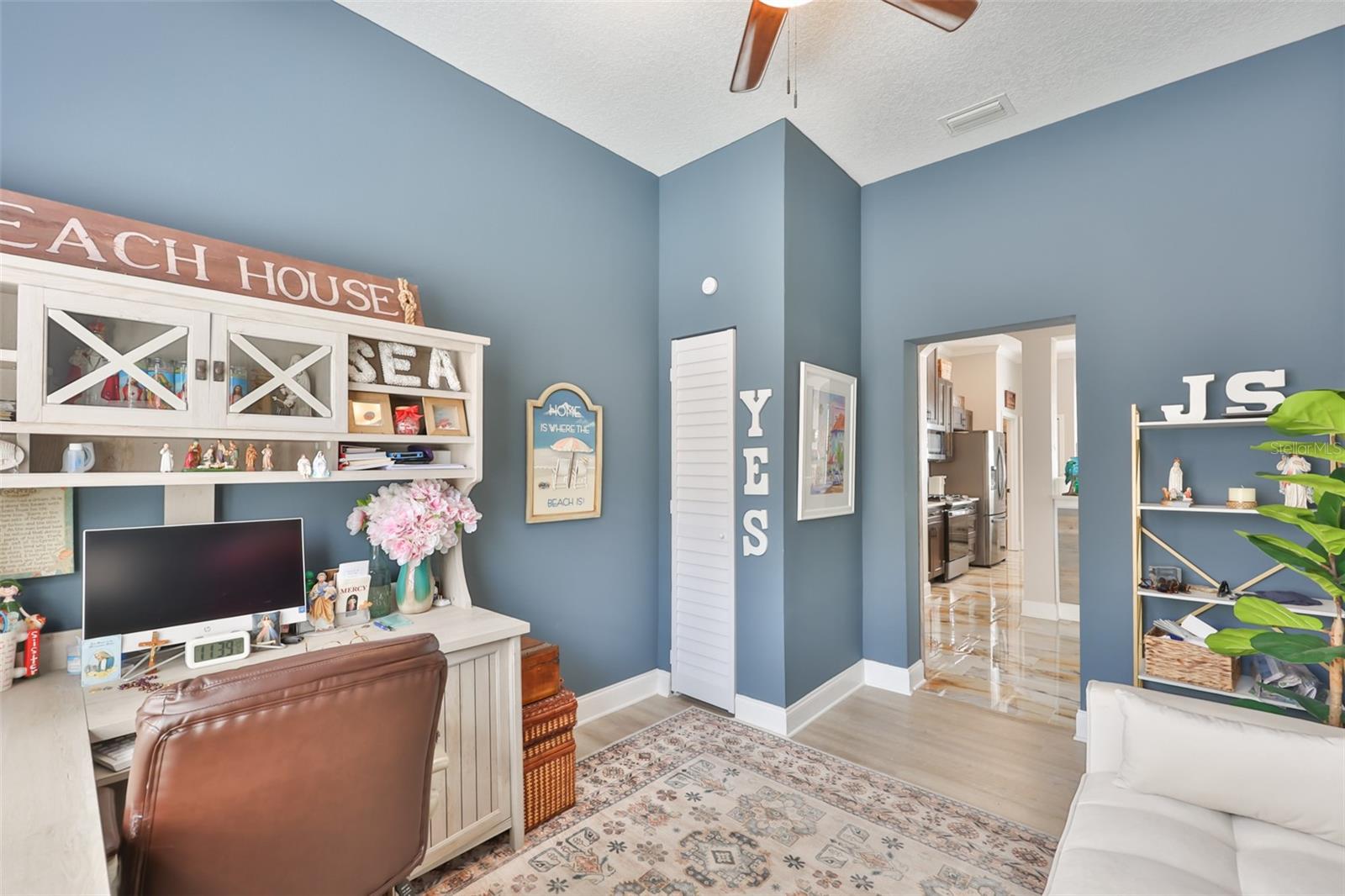 Neutral tones, modern finishes and high ceilings make this a comfortable and relaxing space.