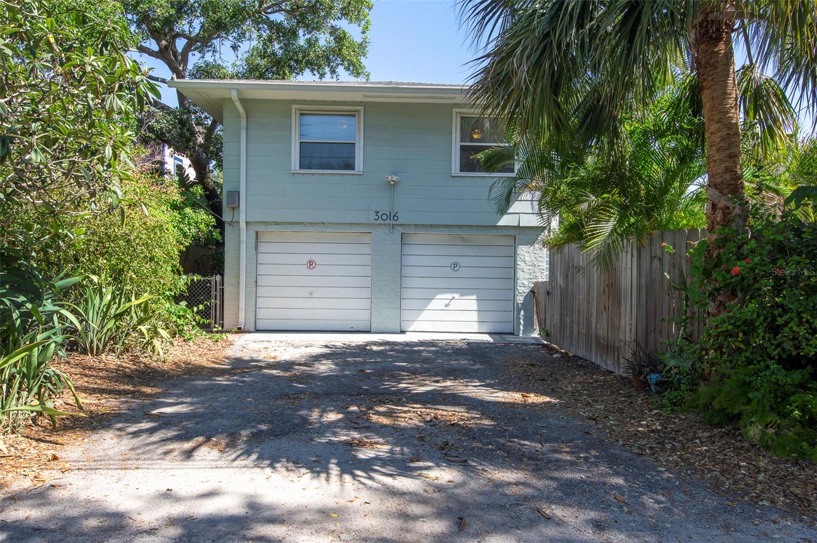 Two car garage+ Washer and dryer for apartment and EV electric Plug.