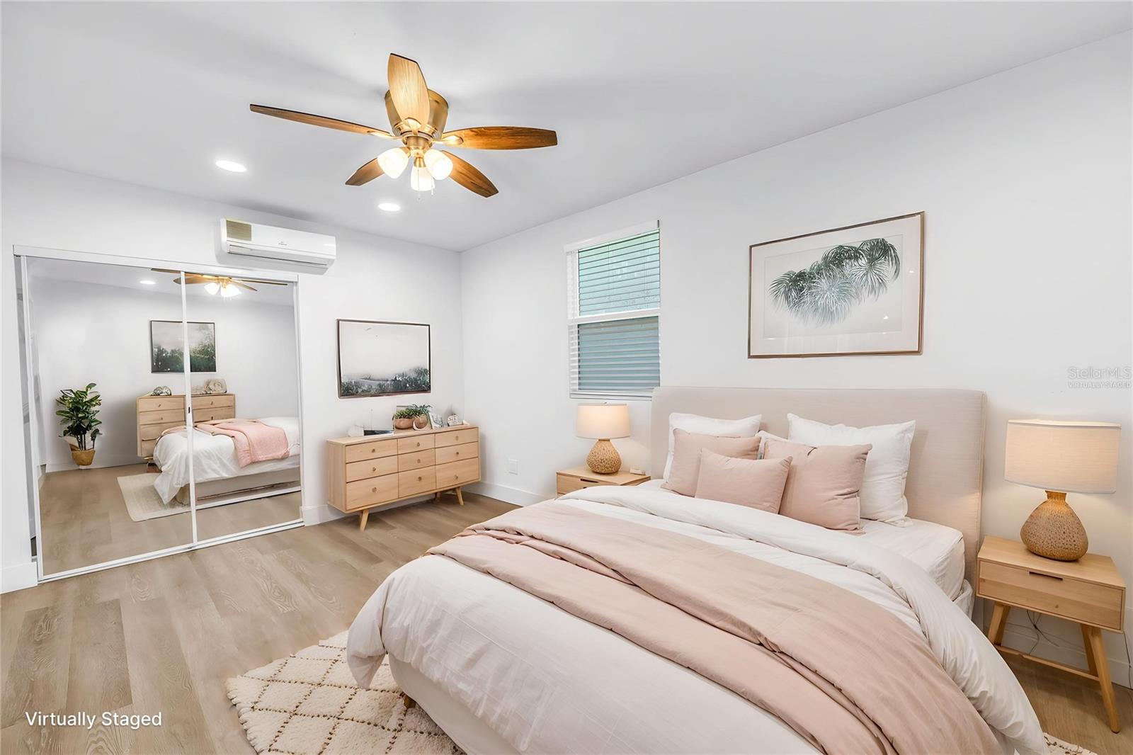 Virtually staged main house primary bedroom.