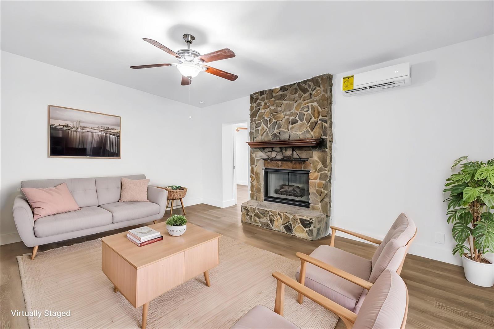 Virtually staged main house living room.