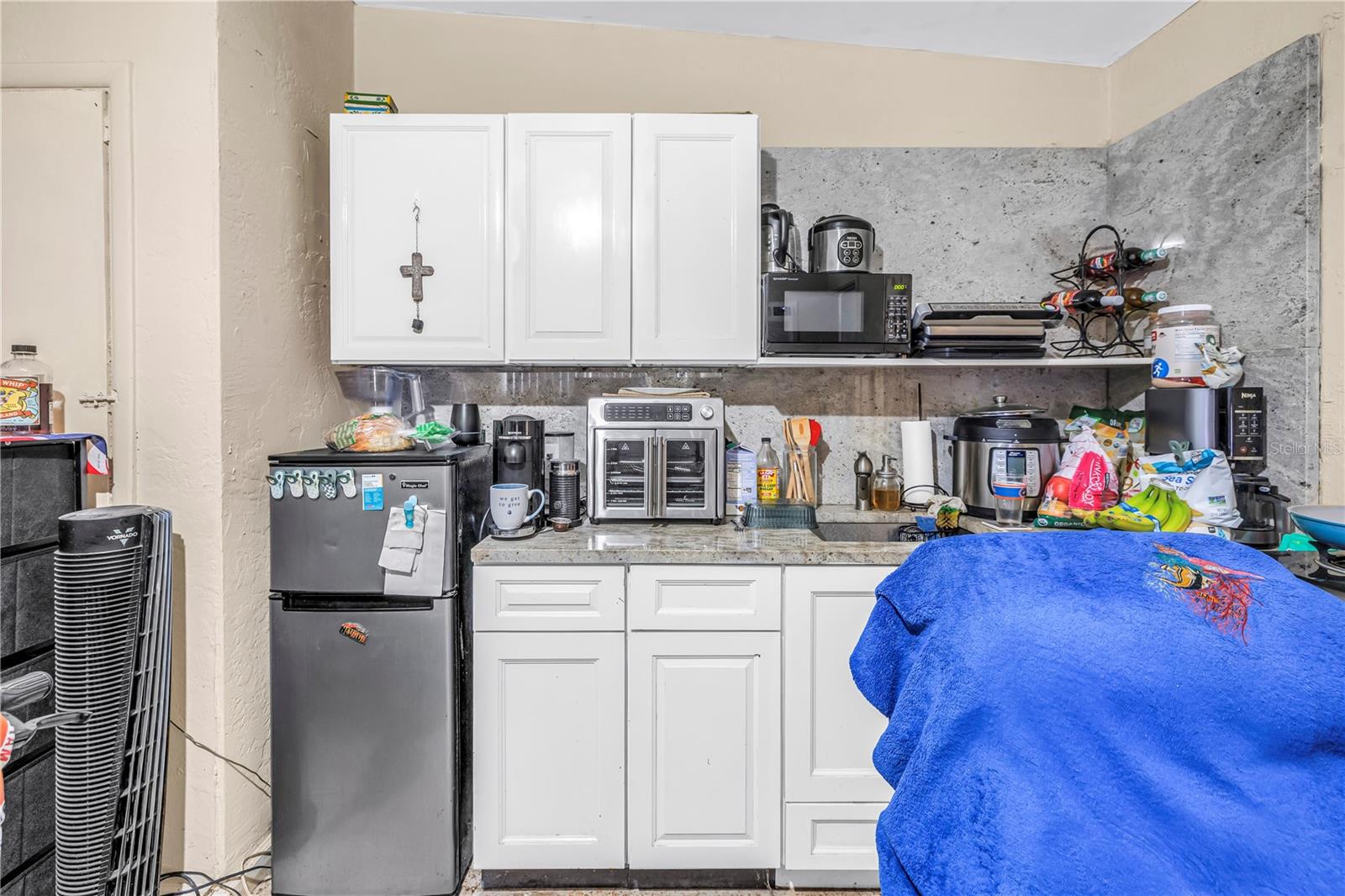 Tenant occupied efficiency unit.