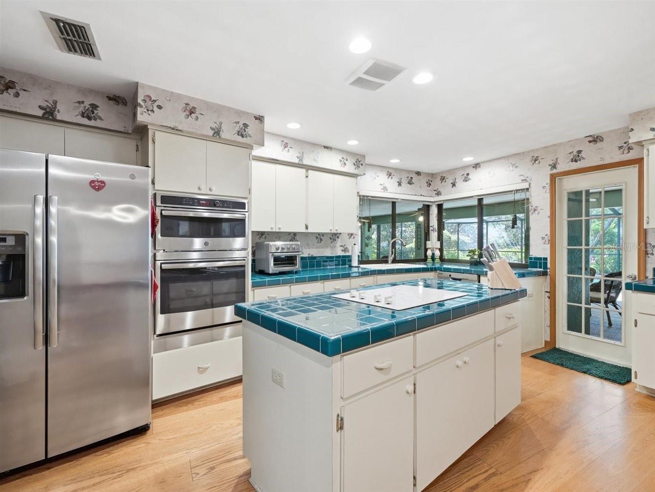 Kitchen with white cooktop