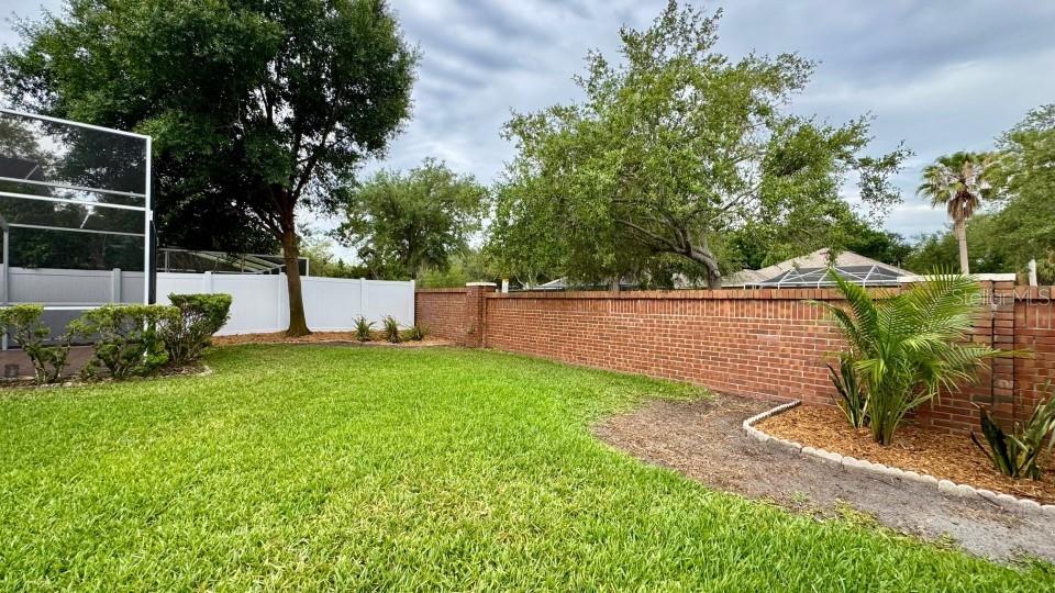 The brick wall is owned and maintained by the LSC CDD