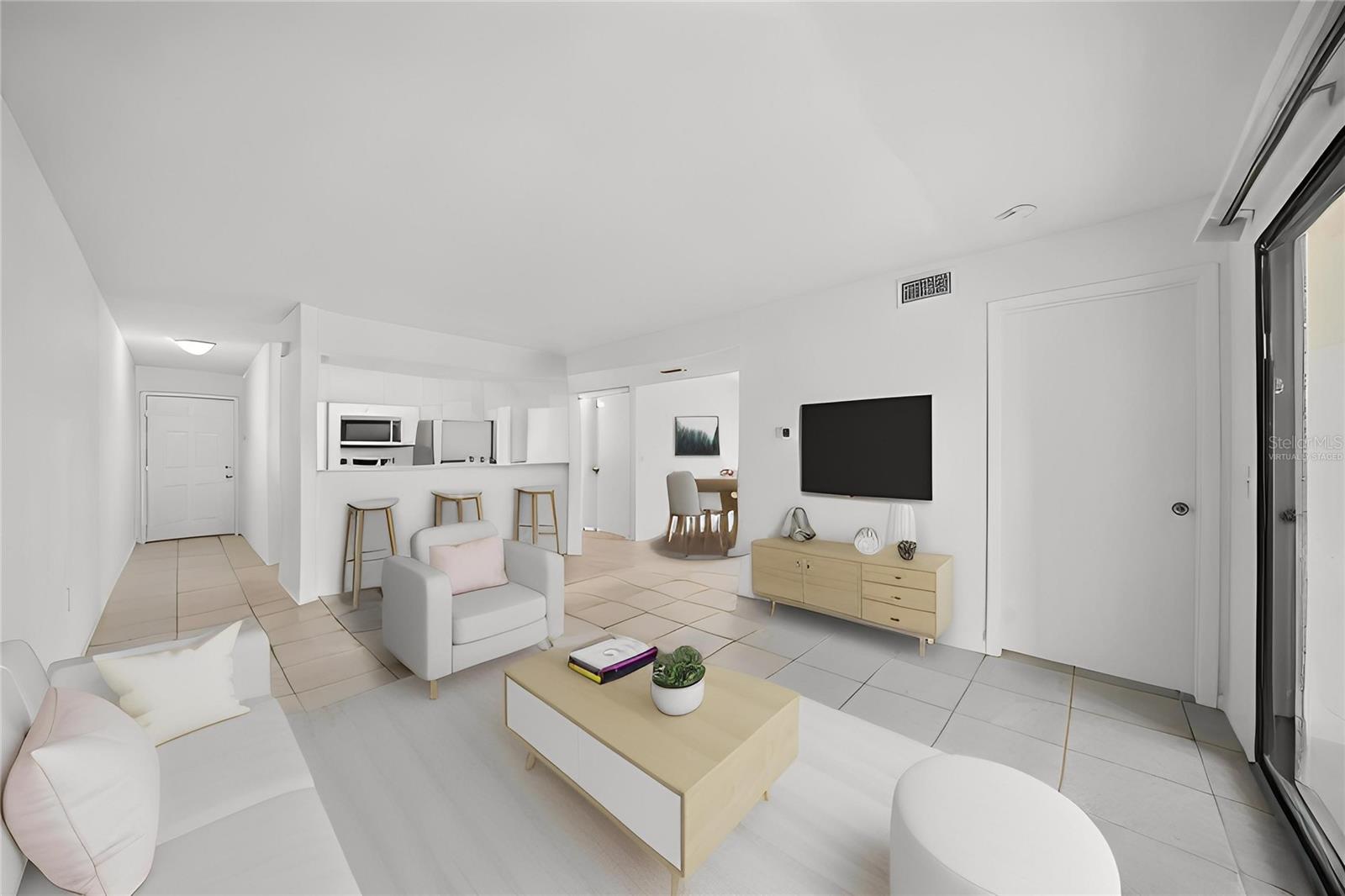 Living Room towards kitchen and dining room-virtually staged