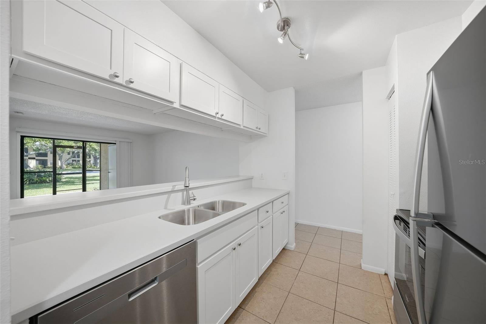 New updated kitchen with solid surface counters