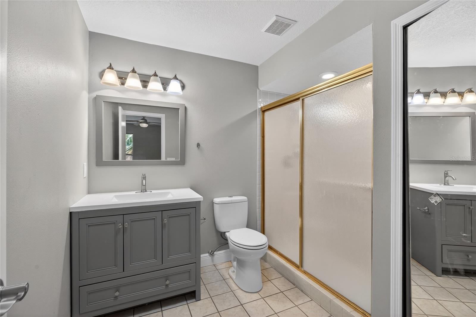 Ensuite bathroom in the primary bedroom.