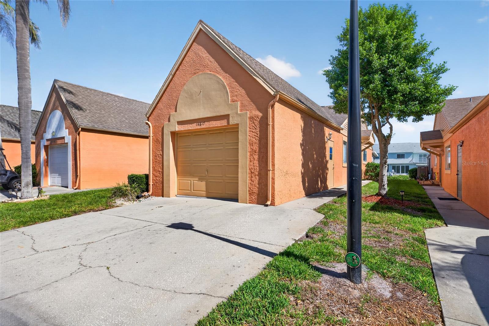 Enter the villa through the garage, or a side door.