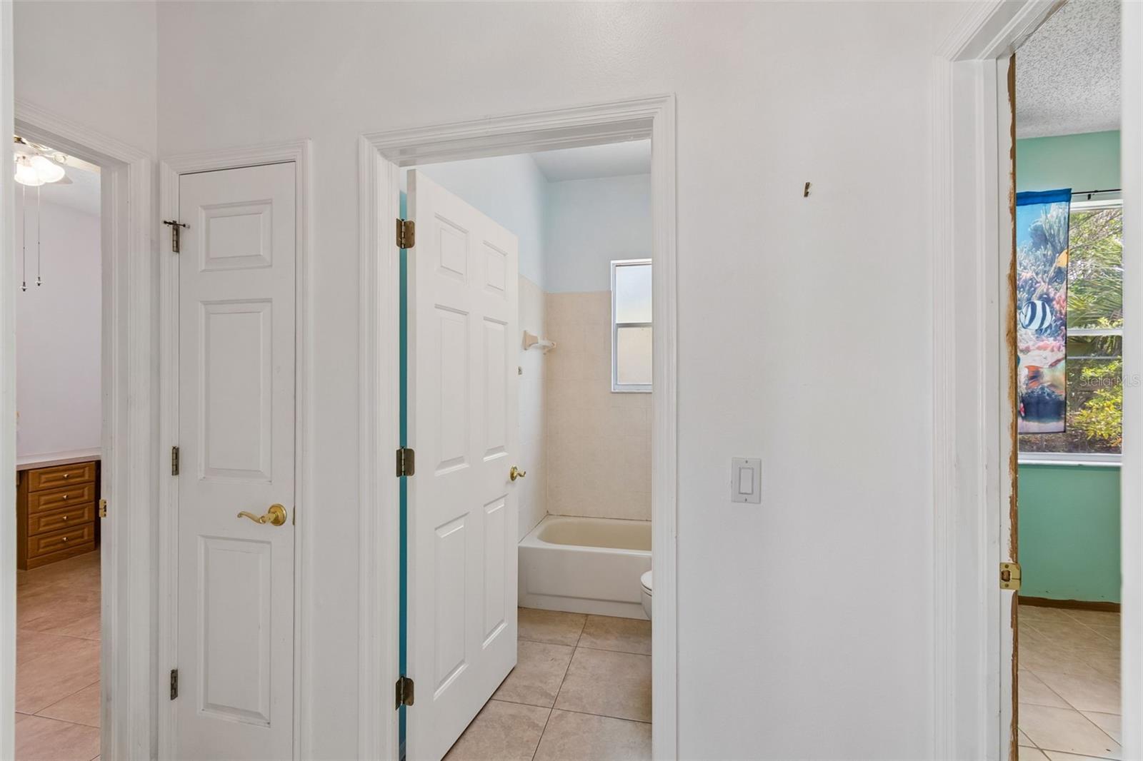 Second Bathroom with tub and shower.