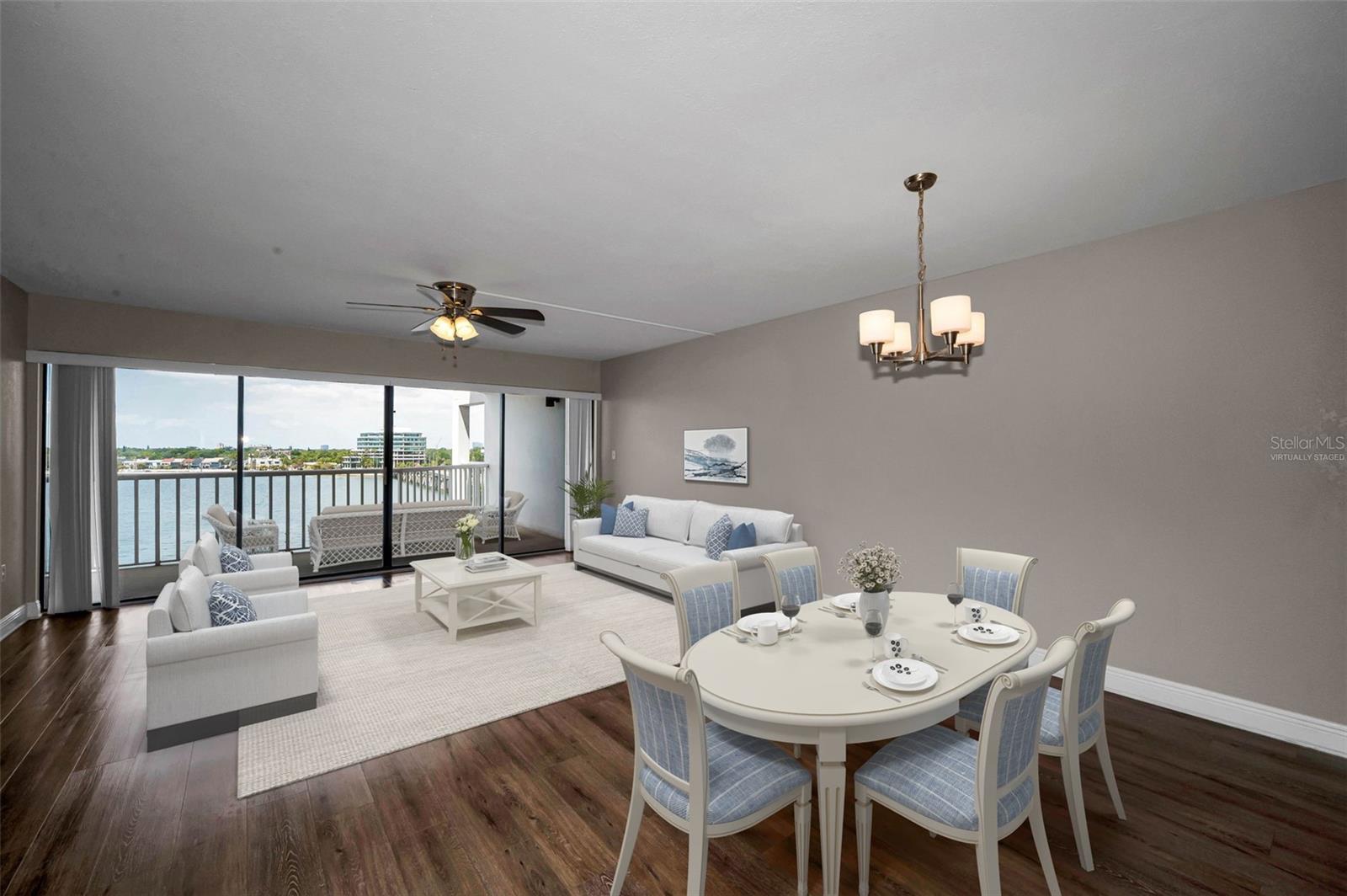 DINING ROOM/LIVING ROOM COMBO (VIRTUALLY STAGED) OVERLOOKING THE WATERFRONT!