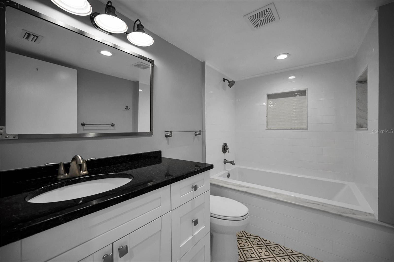Fully Renovated Primary bedroom bath (ensuite) with large soaking tub!