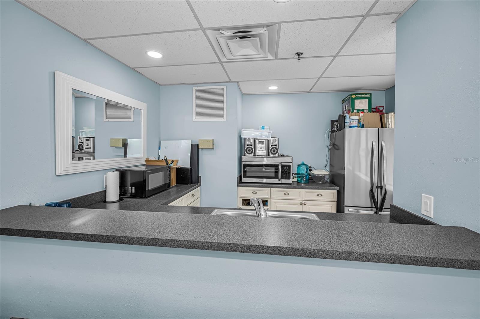 community entertainment room kitchen