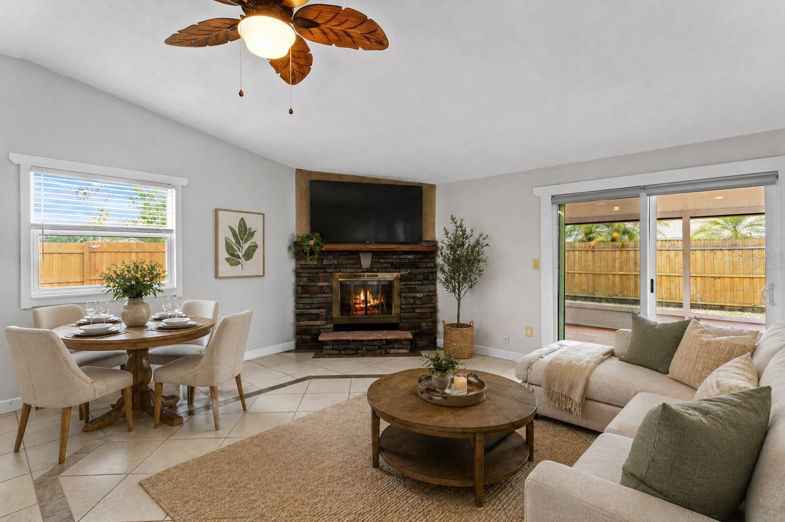 Great Room Plan W/Fireplace and Slider To Lanai - Virtually Staged