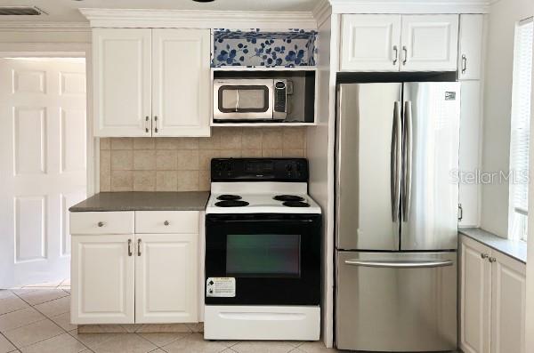 Microwave, Stove and French Door Refigerator