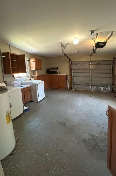 1 Car Garage with a washer and dryer
