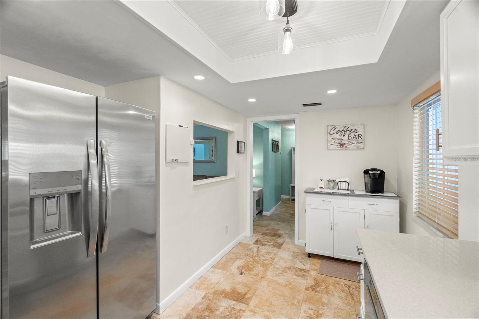 Polished travertine flooring in the kitchen