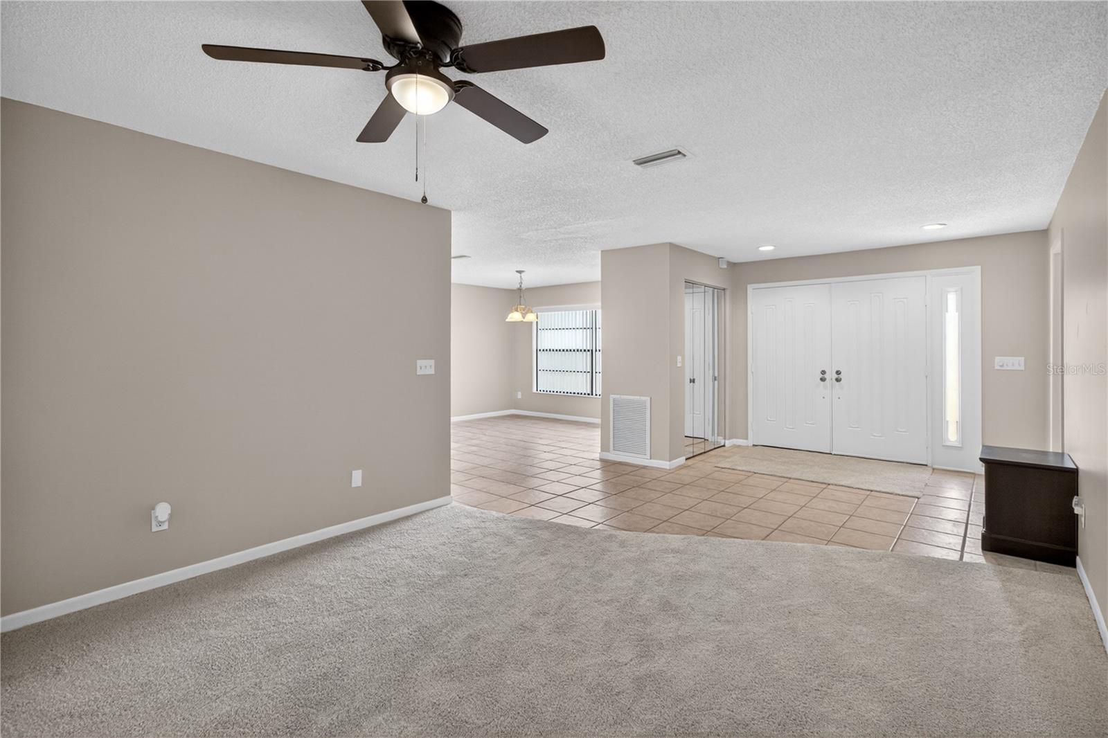 Ling room View to front door and dining