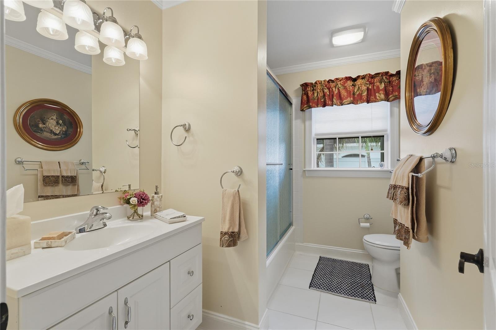 THIS IS THE GUEST BATHROOM THAT IS IN THE HALLWAY BETWEEN THE 2 BEDROOMS
