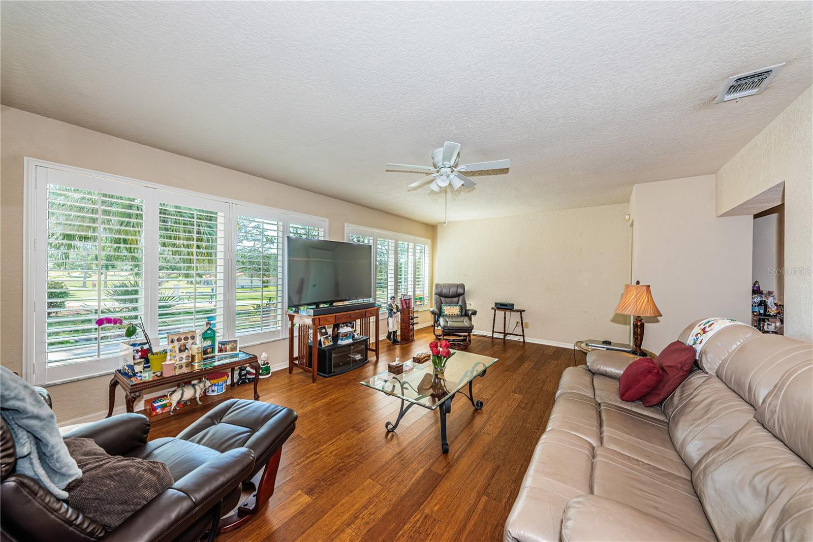 Plantation Shutters on the windows, including newer windows & doors and even a closet in this room.