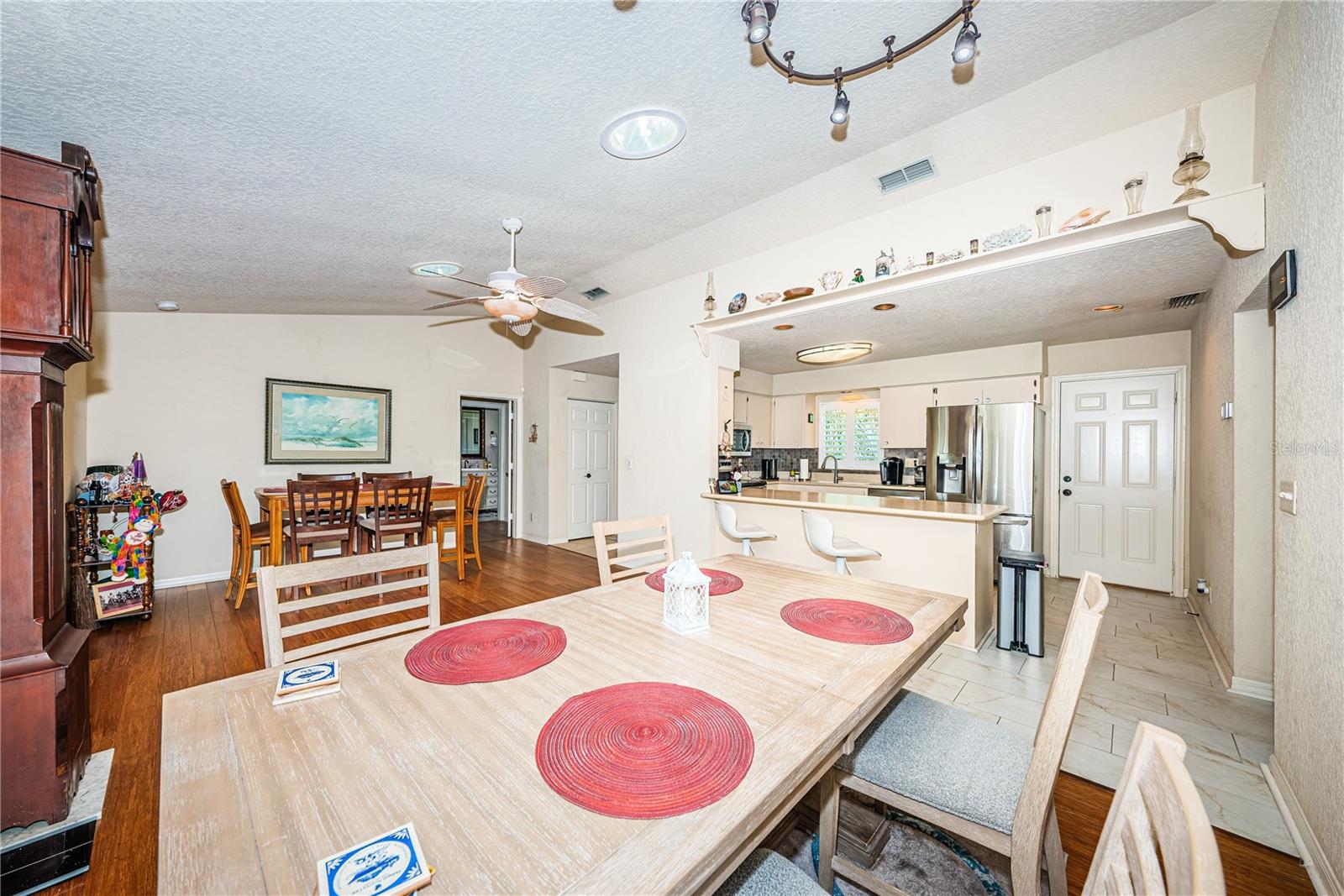 Kitchen with large Breakfast Bar opens to Great Room